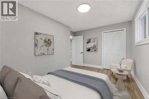 Virtually Staged - 65 Woodman Drive S, Hamilton, ON - Indoor Photo Showing Bedroom