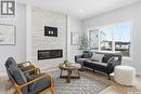 430 Leskiw Bend, Saskatoon, SK  - Indoor Photo Showing Living Room With Fireplace 
