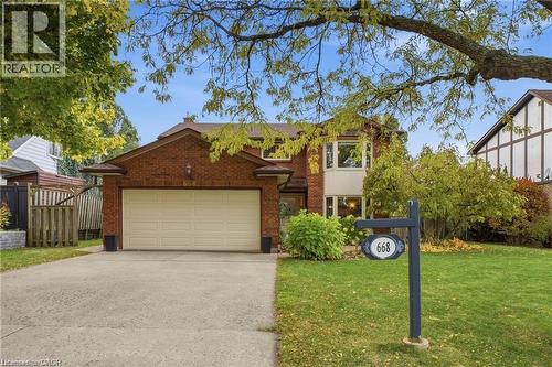 Front View with double driveway and double garage - 668 Tomahawk Crescent, Ancaster, ON - Outdoor