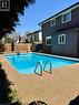 Inground Pool with privacy, grassy area and shed - 668 Tomahawk Crescent, Ancaster, ON  - Outdoor With In Ground Pool 