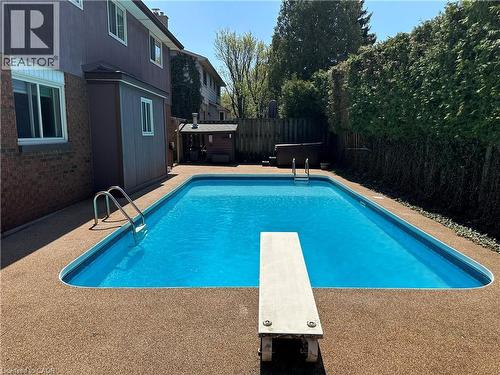 Inground Pool with hot tub and privacy - 668 Tomahawk Crescent, Ancaster, ON - Outdoor With In Ground Pool