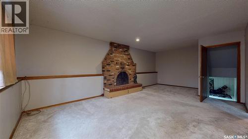 114 Windfield Road, Regina, SK - Indoor Photo Showing Other Room With Fireplace