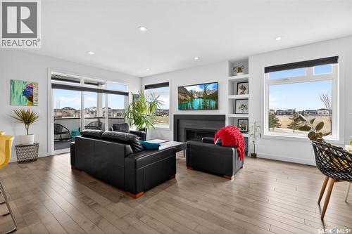 5501 Norseman Crescent, Regina, SK - Indoor Photo Showing Living Room With Fireplace