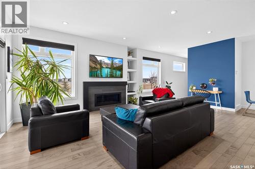 5501 Norseman Crescent, Regina, SK - Indoor Photo Showing Living Room With Fireplace