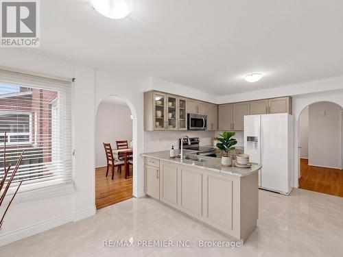 Virtually Staged - 4579 Guildwood Way, Mississauga, ON - Indoor Photo Showing Kitchen With Double Sink