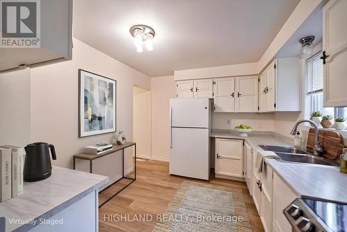 6455 Tisler Crescent, Mississauga, ON - Indoor Photo Showing Kitchen With Double Sink