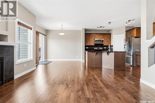 8814 Herman Crescent, Regina, SK - Indoor Photo Showing Kitchen With Fireplace