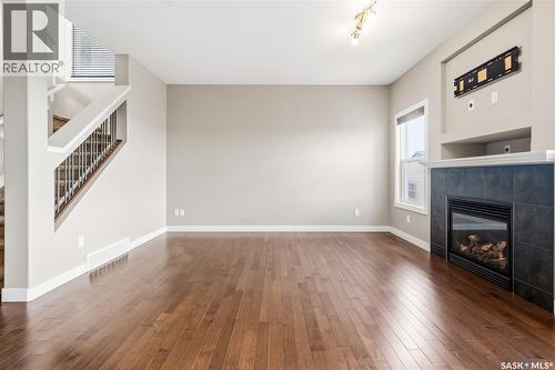 8814 Herman Crescent, Regina, SK - Indoor Photo Showing Other Room With Fireplace