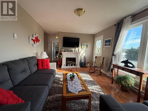 / - 68 Fox Harbour Road, Dunville, NL - Indoor Photo Showing Living Room With Fireplace