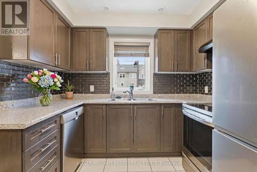 Virtually staged with AI - 67 Tabaret Crescent, Oshawa (Windfields), ON - Indoor Photo Showing Kitchen With Double Sink