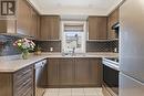 Virtually staged with AI - 67 Tabaret Crescent, Oshawa (Windfields), ON  - Indoor Photo Showing Kitchen With Double Sink 