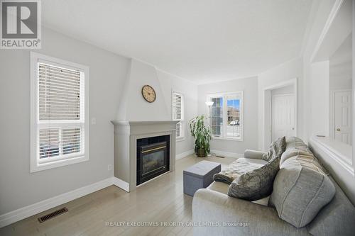 24 Archbury Circle, Caledon, ON - Indoor Photo Showing Living Room With Fireplace