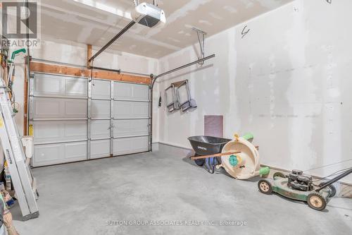 166 Maple Street, Mapleton, ON - Indoor Photo Showing Garage