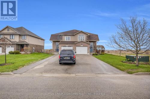 166 Maple Street, Mapleton, ON - Outdoor With Facade