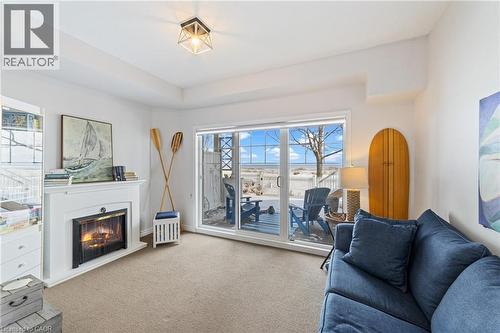 337 Beach Boulevard Unit# 3, Hamilton, ON - Indoor Photo Showing Living Room With Fireplace
