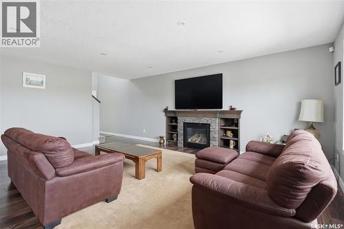 4009 Alton Crescent, Regina, SK - Indoor Photo Showing Living Room With Fireplace