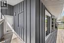 Exterior deck featuring painted vertical siding, a sliding glass door, and a white screen door - 515 Bobbybrook Drive, London, ON  - Outdoor With Deck Patio Veranda With Exterior 