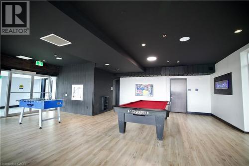 Recreation room with wood-finish flooring, a dark ceiling, and recessed lighting - 330 Phillip Street Unit# S605, Waterloo, ON - Indoor Photo Showing Other Room