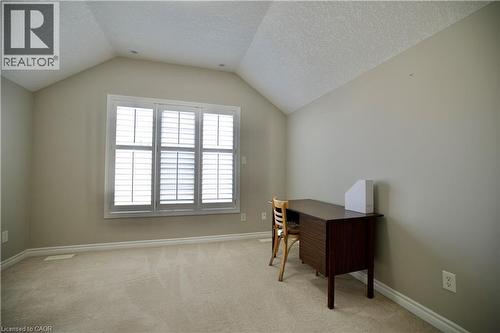 Room featuring a vaulted ceiling and neutral wall tones - 711 Cedar Bend Drive, Waterloo, ON - Indoor