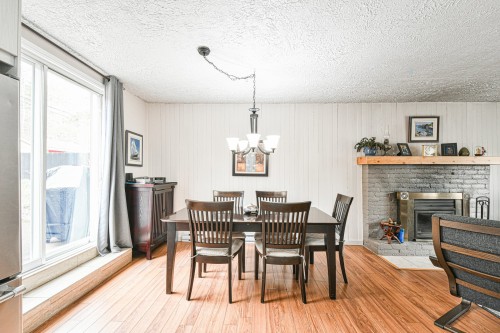 Salle à manger - 340 Rue Des Plaines, Sainte-Adèle, QC - Indoor Photo Showing Dining Room With Fireplace