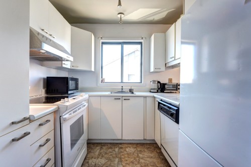 Cuisine - 302-64 Rue Pierre-Laporte, Saint-Eustache, QC - Indoor Photo Showing Kitchen