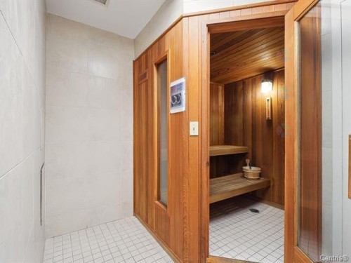 Sauna - 711-2160 Av. Terry-Fox, Laval (Chomedey), QC - Indoor Photo Showing Other Room