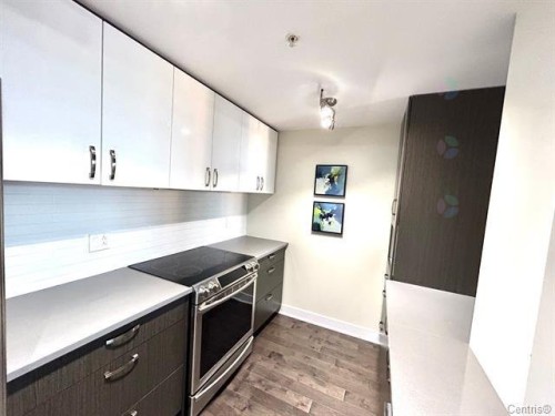 Kitchen - 711-2160 Av. Terry-Fox, Laval (Chomedey), QC - Indoor Photo Showing Kitchen
