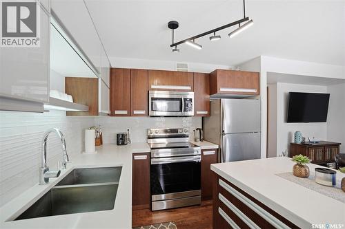 314 1303 Paton Crescent, Saskatoon, SK - Indoor Photo Showing Kitchen With Stainless Steel Kitchen With Double Sink With Upgraded Kitchen