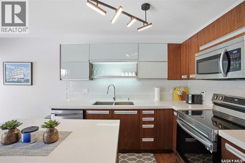 314 1303 Paton Crescent, Saskatoon, SK - Indoor Photo Showing Kitchen With Stainless Steel Kitchen With Double Sink With Upgraded Kitchen
