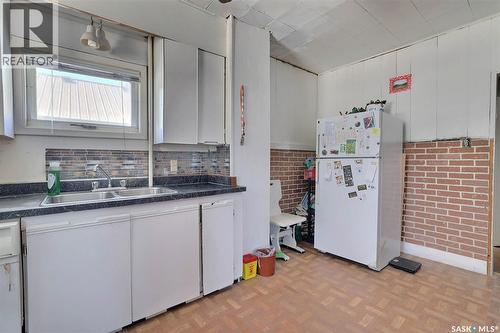 211 Main Street, Vibank, SK - Indoor Photo Showing Kitchen With Double Sink
