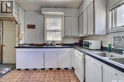 211 Main Street, Vibank, SK - Indoor Photo Showing Kitchen With Double Sink