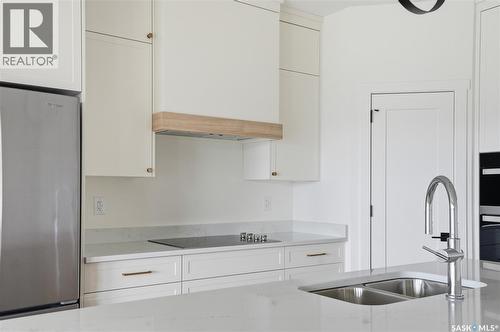 20 720 Brighton Boulevard, Saskatoon, SK - Indoor Photo Showing Kitchen With Double Sink With Upgraded Kitchen
