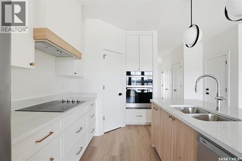 20 720 Brighton Boulevard, Saskatoon, SK - Indoor Photo Showing Kitchen With Double Sink With Upgraded Kitchen