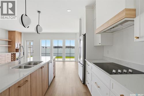 20 720 Brighton Boulevard, Saskatoon, SK - Indoor Photo Showing Kitchen With Double Sink With Upgraded Kitchen