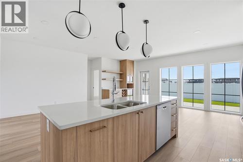 20 720 Brighton Boulevard, Saskatoon, SK - Indoor Photo Showing Kitchen With Double Sink