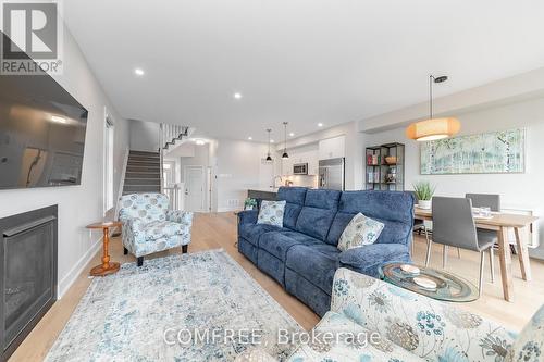 663 Putney Crescent, Ottawa, ON - Indoor Photo Showing Living Room With Fireplace