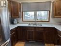 606 Staveley Crescent, Weyburn, SK  - Indoor Photo Showing Kitchen With Double Sink 