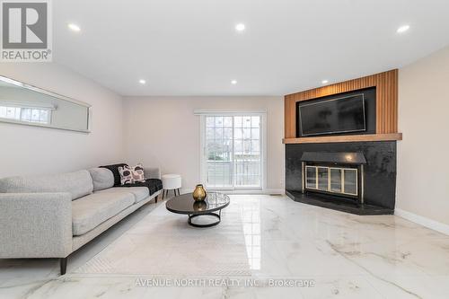 406 Verdon Private, Ottawa, ON - Indoor Photo Showing Living Room With Fireplace