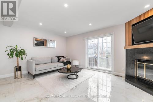 406 Verdon Private, Ottawa, ON - Indoor Photo Showing Living Room With Fireplace