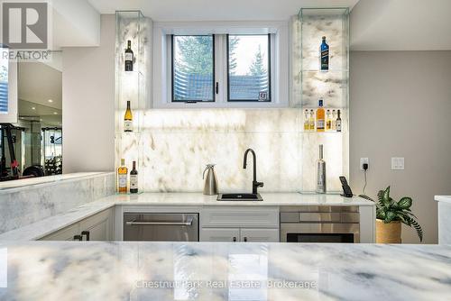 Backlit white onyx custom bar in basement - 1 Windrose Valley Boulevard, Clearview, ON - Indoor Photo Showing Kitchen With Upgraded Kitchen