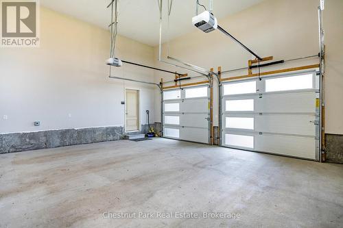 2 of the 3 garages (double car garage) - 1 Windrose Valley Boulevard, Clearview, ON - Indoor Photo Showing Garage