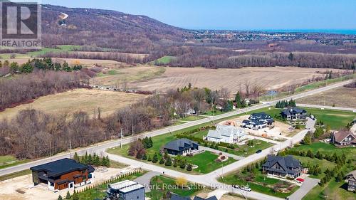 Located on a large lot minutes to Osler Ski Club - 1 Windrose Valley Boulevard, Clearview, ON - Outdoor With View