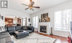 LARGE MAIN FLOOR F/ROOM WITH GAS FIREPLACE. - 