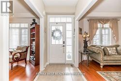 ELEGANT ENTRY OPENS TO A CUSTOM OPEN STAIRCASE. - 