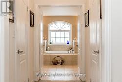 HIS AND HERS WALK-IN CLOSETS. - 