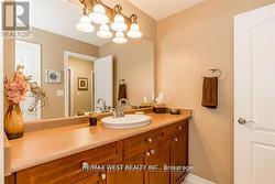 4PC. SHARED ENSUITE, RAISED CUSTOM CABINET/SINK. - 