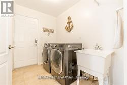 M/F LAUNDRY ROOM WITH GARAGE ACCESS & CLOSET. - 