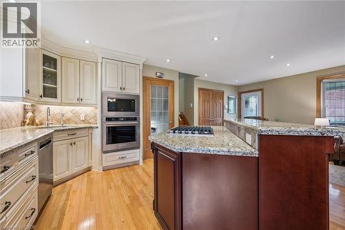 Kitchen featuring wood-finish flooring and recessed lighting - 574 Sprucehill Avenue, Waterloo, ON - Indoor Photo Showing Kitchen With Upgraded Kitchen