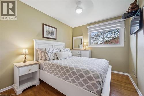 Hardwood flooring throughout bedroom space - 574 Sprucehill Avenue, Waterloo, ON - Indoor Photo Showing Bedroom