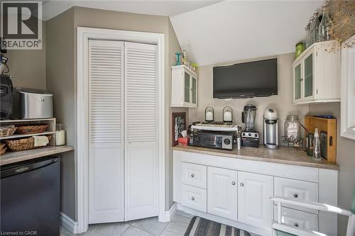 White louvered bifold doors complement the surrounding gray wall - 574 Sprucehill Avenue, Waterloo, ON - Indoor Photo Showing Other Room